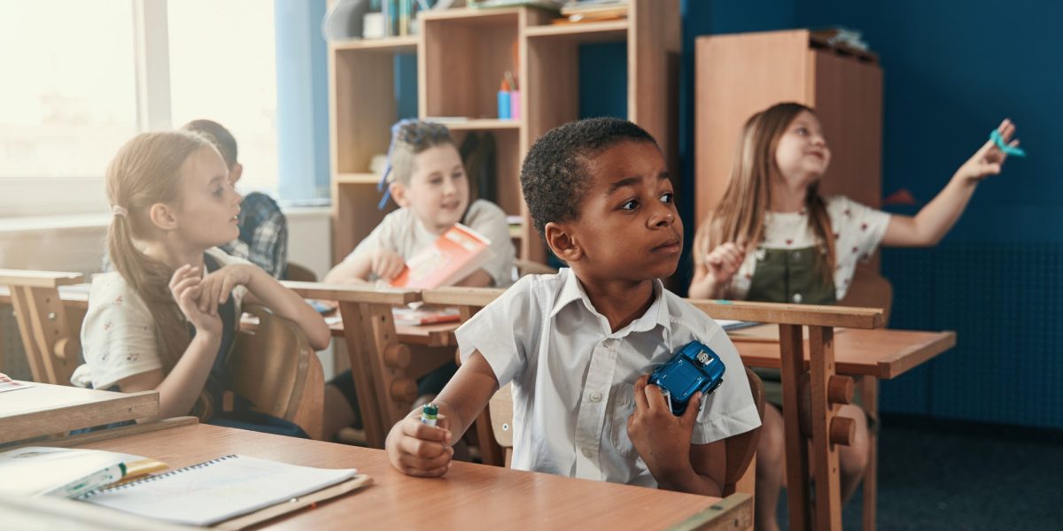 Cute kids paying attention to the teacher